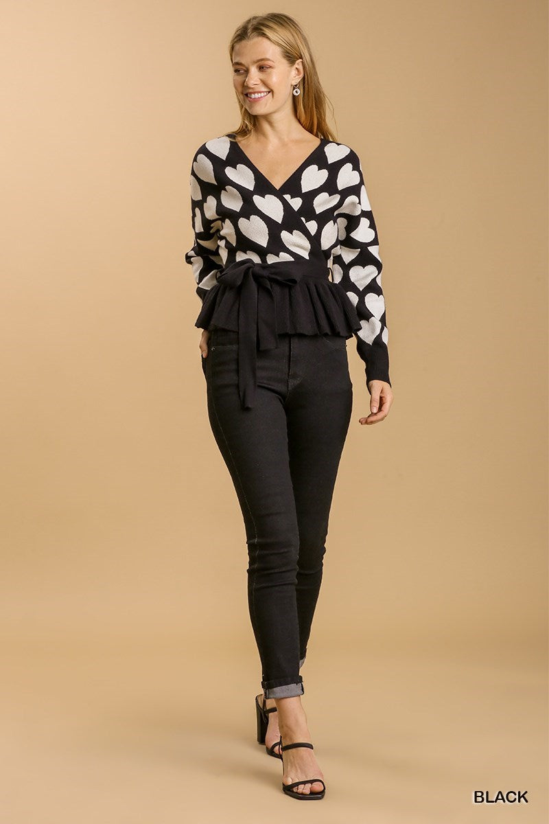 Black & White Baby Doll Sweater with Long Sleeves, Heart Prints, Front Tie, Pleated Waist and Open Back.