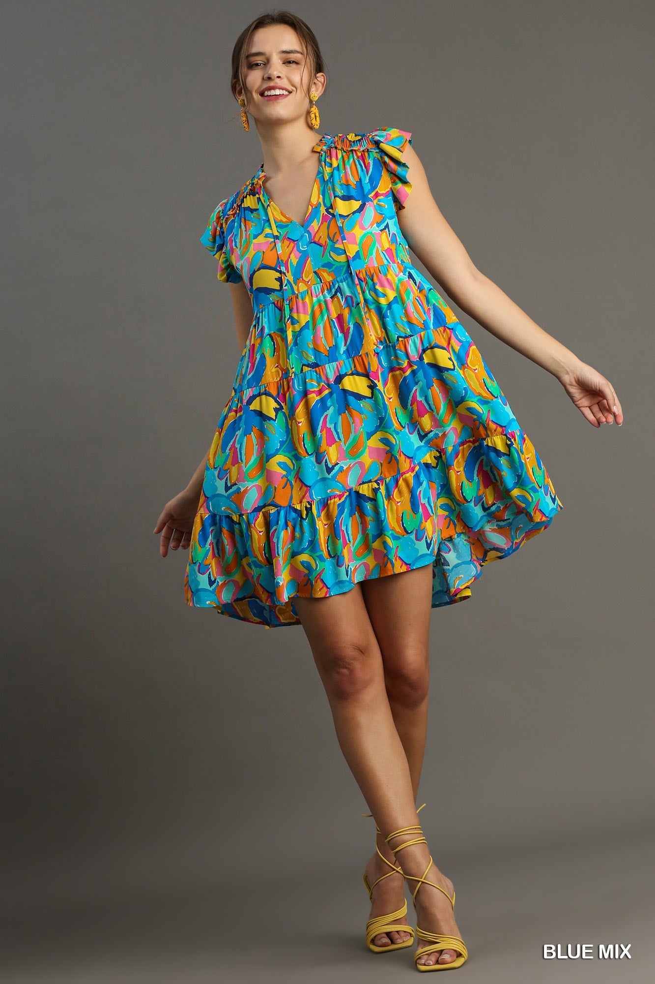 Blue Abstract Print A-Line Tiered Smocked Detail Dress with Ruffle Sleeves, Front Tie
Colors: Sky Blue, Yellow, Orange, Pink, Green, Blue