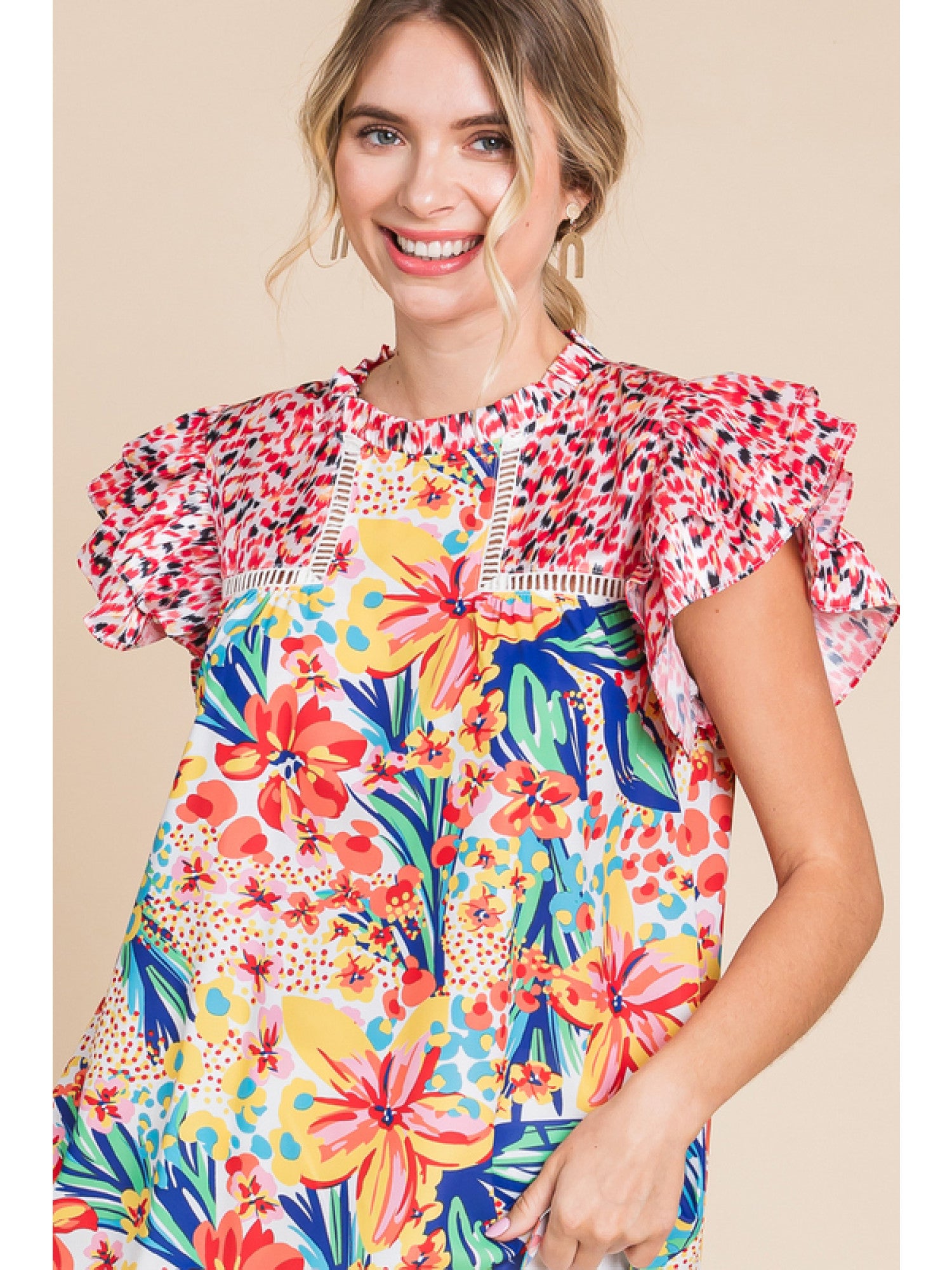 Red mix multicolor floral print top with frilled neck and ruffle cap sleeve.