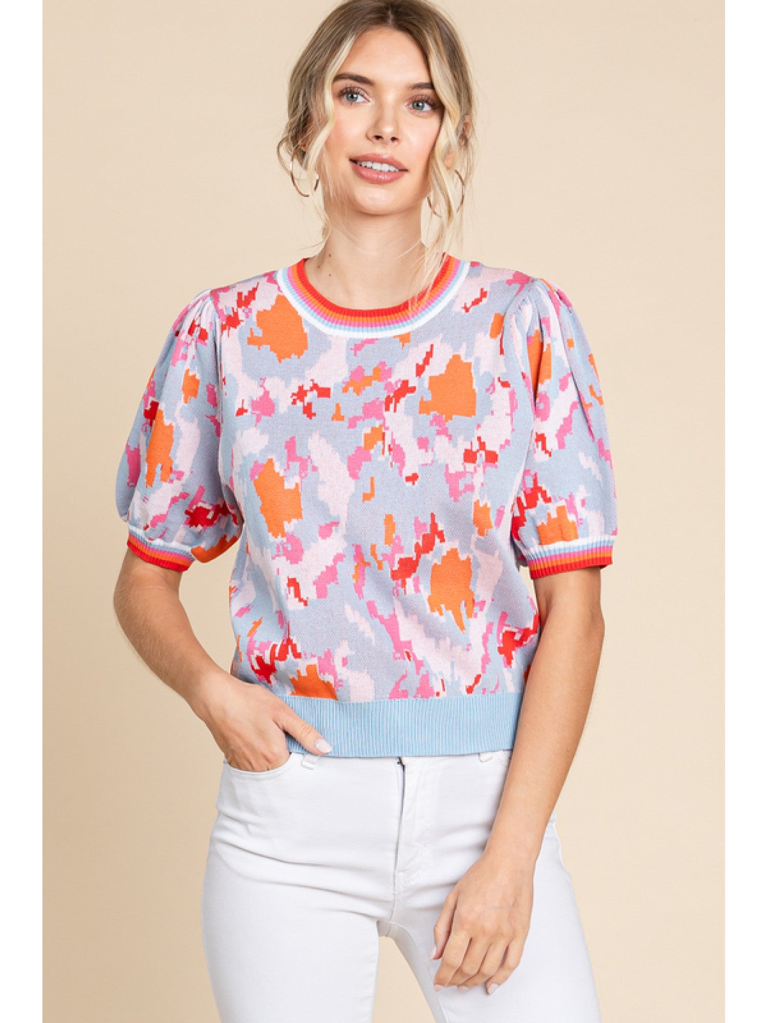 - Print knit top with a U-neck, short bubble sleeves, stretch-band cuffs and striped.
- non-sheer, lightweight.