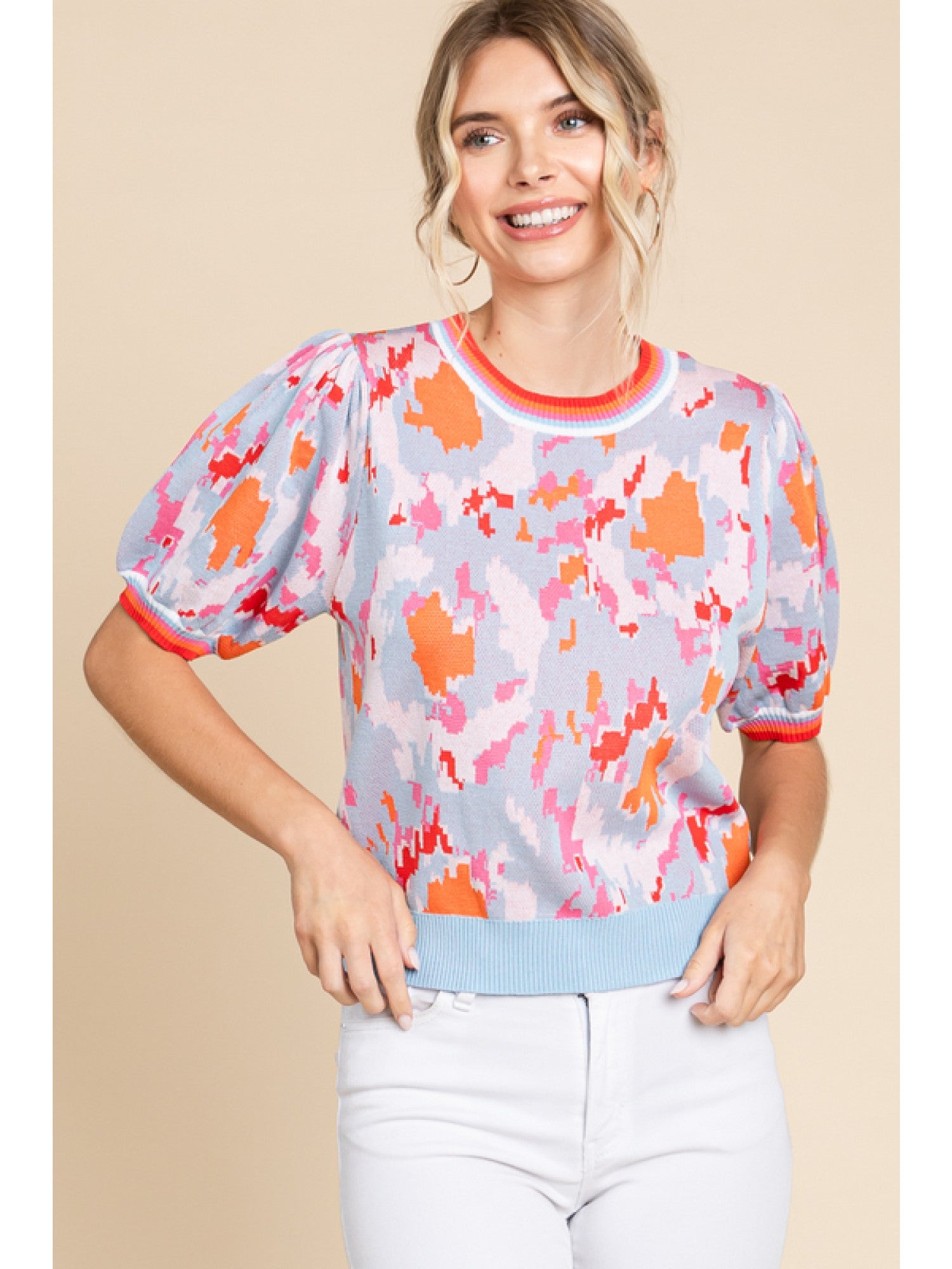 - Print knit top with a U-neck, short bubble sleeves, stretch-band cuffs and striped.
- non-sheer, lightweight.