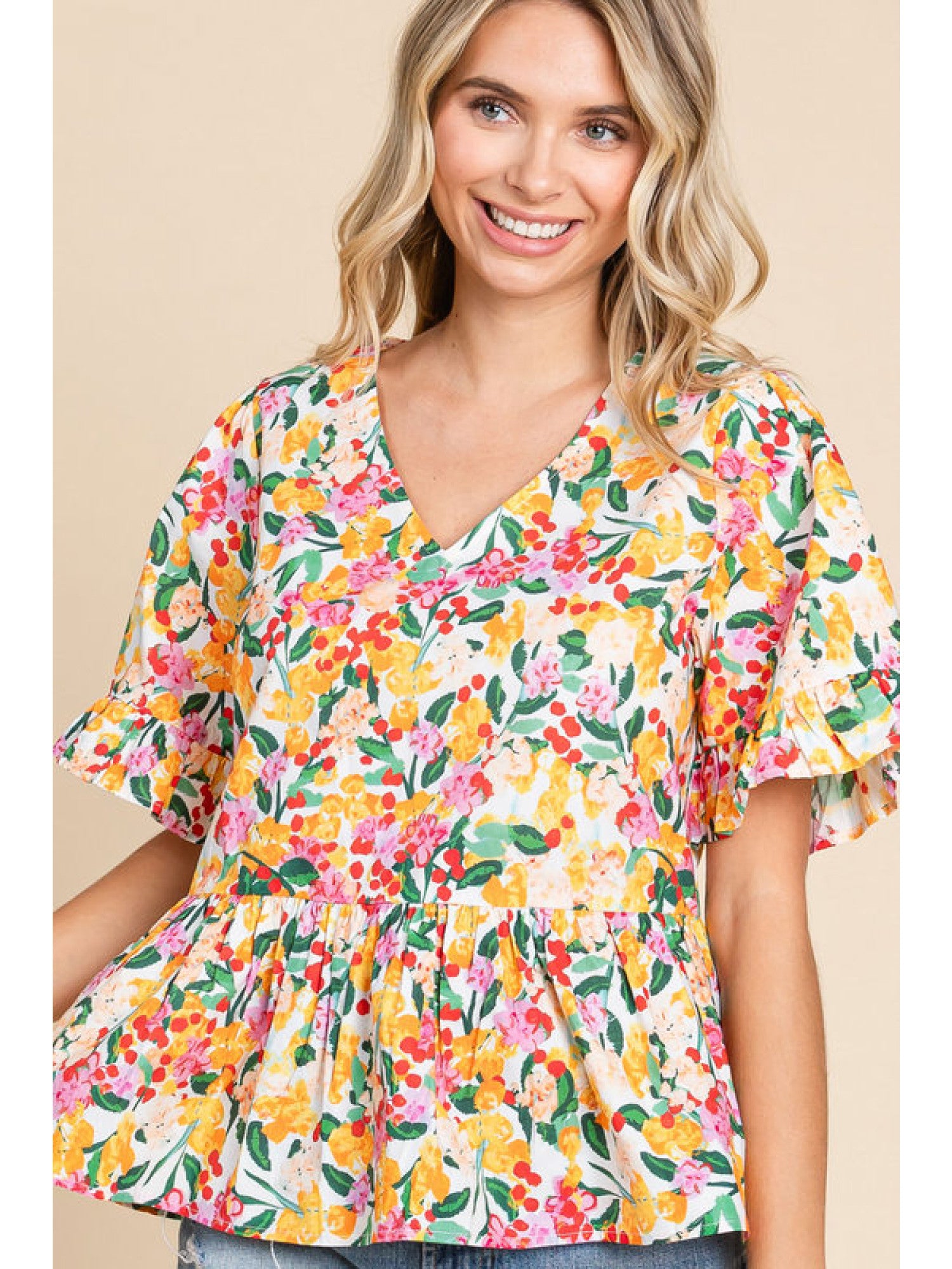 - Off Whie Floral print peplum top with a V-neck, short sleeves, and frilled cuffs.
- Unlined, non-sheer, lightweight.