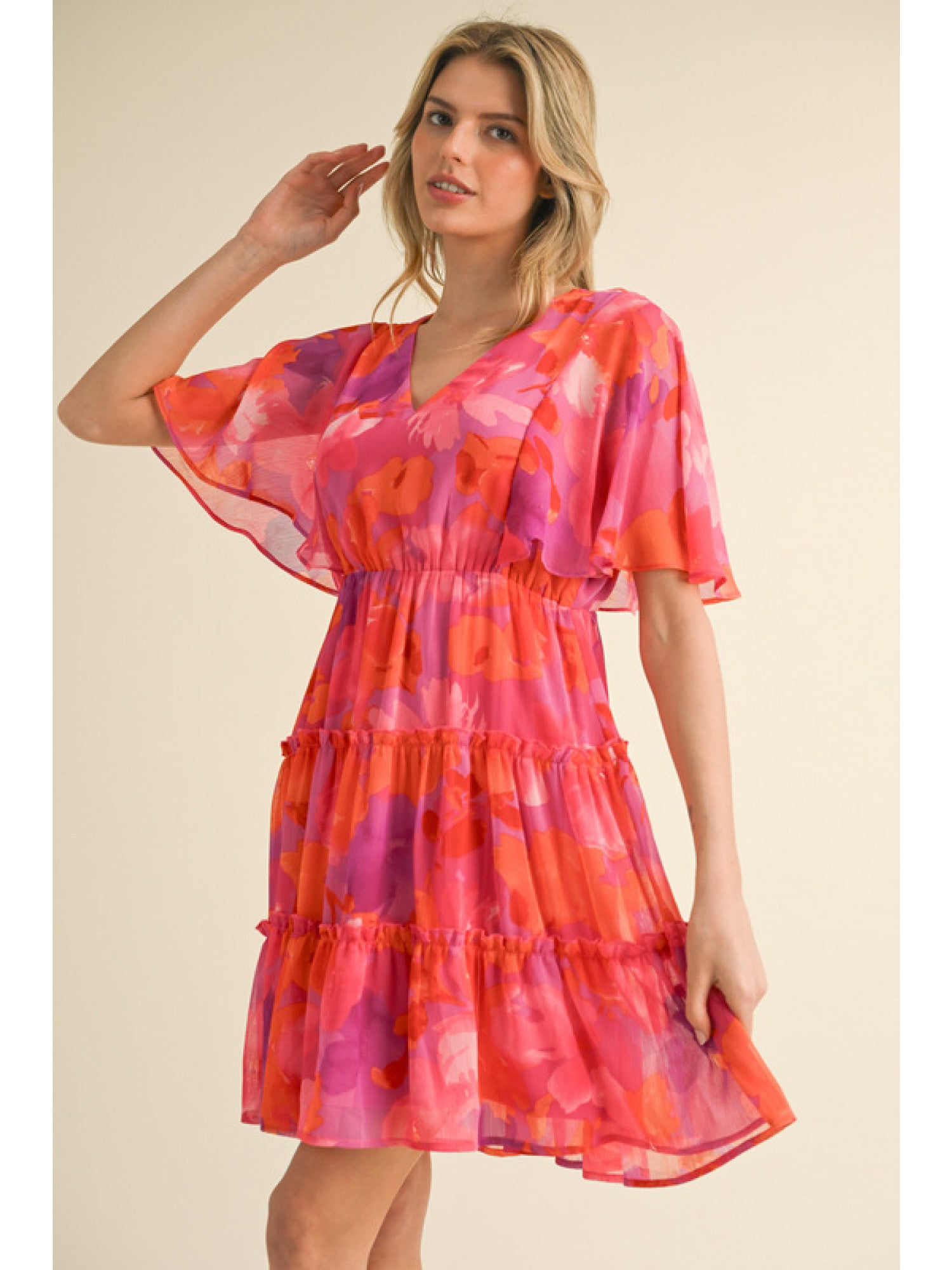 - Fuchsia, Orange and Purple floral print chiffon dress with a V-neck, short bell sleeves, and frilled tiered skirt.
- Lined, non-sheer, lightweight.