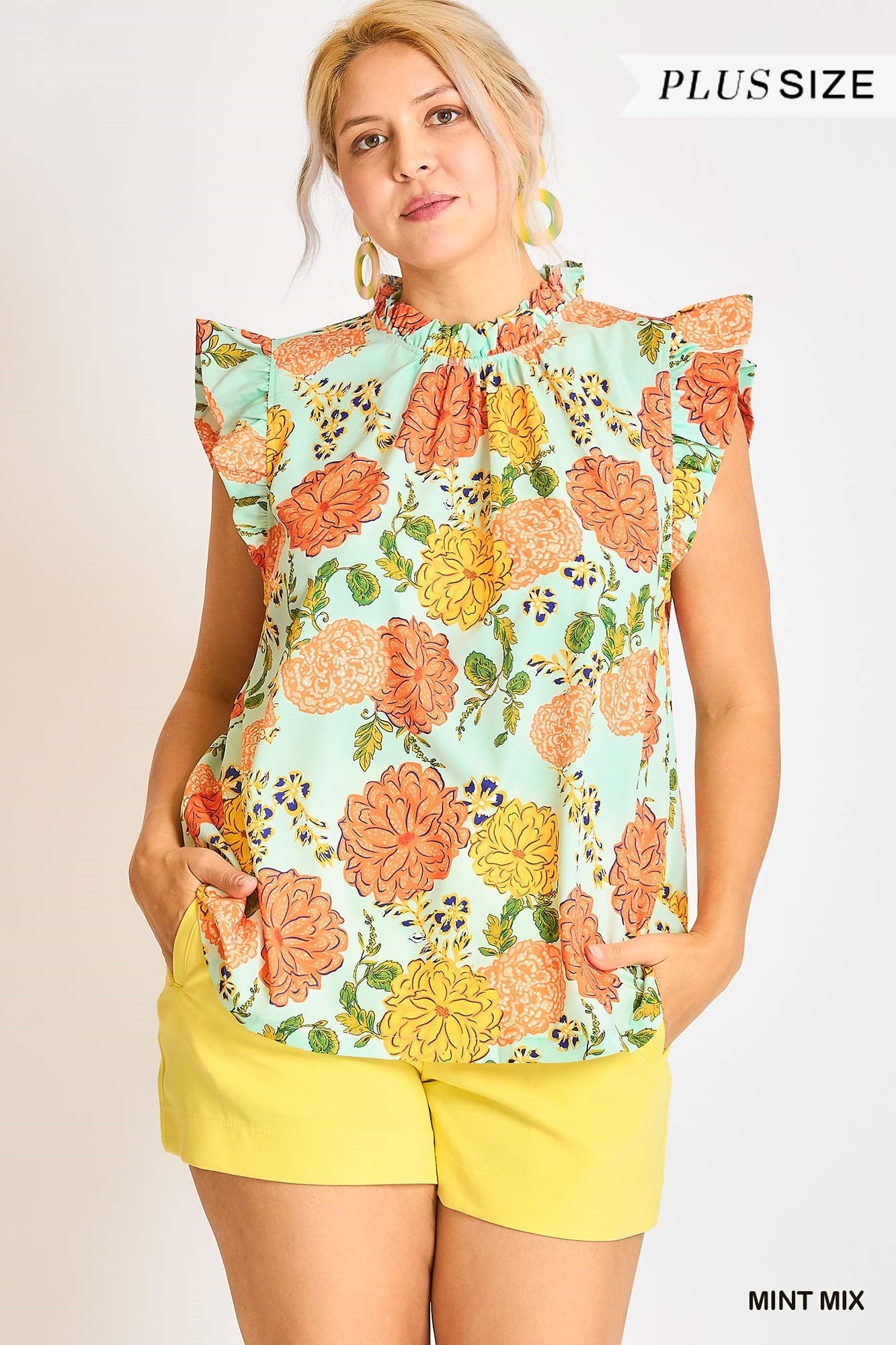 Mint Floral Print High Ruffle Neck Boxy Cut Top with Ruffle Sleeve. Orange & Pink Floral Design.