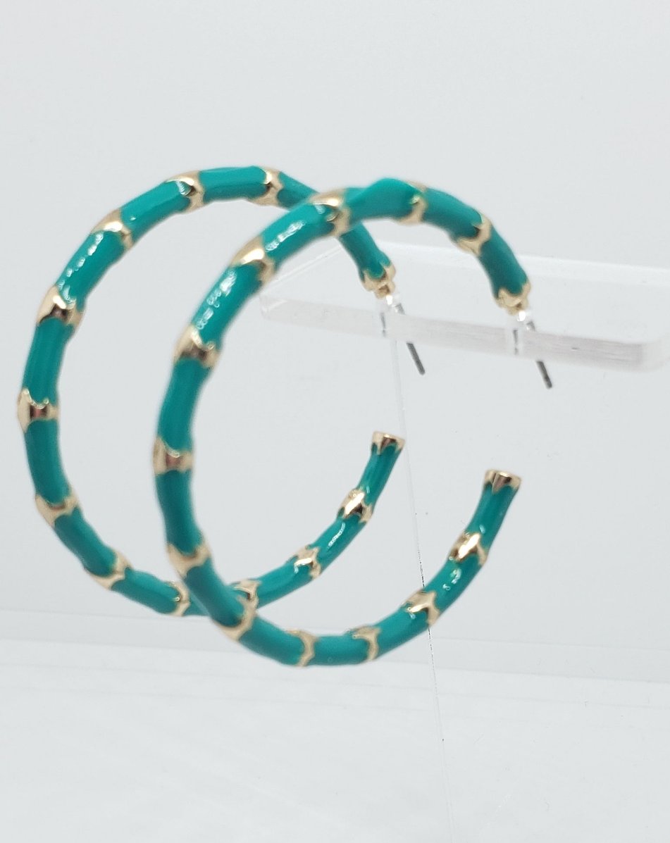 Lightweight Acrylic Resin Green and Gold Hoop Earrings.
Approximate Length: 1.75"