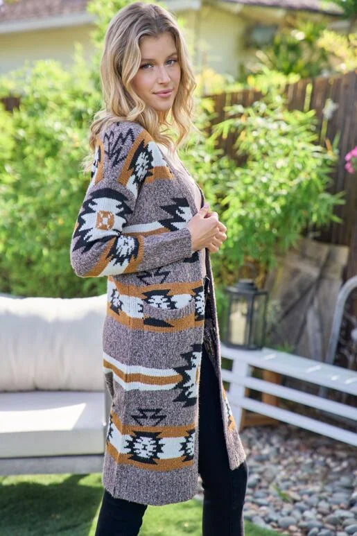 Aztec Southwestern Pattern Long Cardigan:
- Heavy weight and warm
- Open front cardigan with front pockets
- Colors: Black, Ivory, Brown