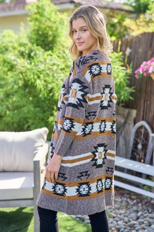 Aztec Southwestern Pattern Long Cardigan:
- Heavy weight and warm
- Open front cardigan with front pockets
- Colors: Black, Ivory, Brown