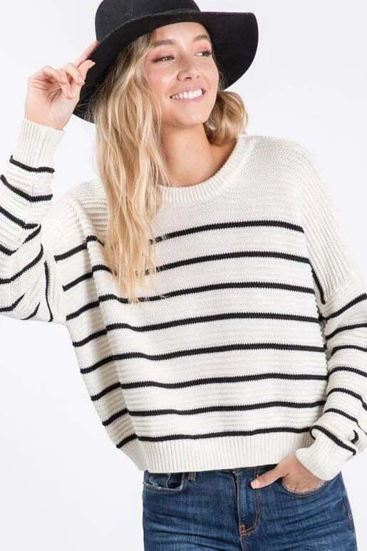 Winter Wonder Ivory and Black Striped Sweater with Zigzag ribbed knit pattern.
Color: Ivory
Super soft casual and slightly oversized for a slouchy fit with a shorter length.