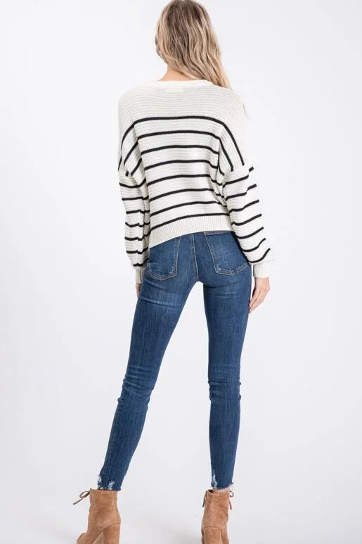 Winter Wonder Ivory and Black Striped Sweater with Zigzag ribbed knit pattern.
Color: Ivory
Super soft casual and slightly oversized for a slouchy fit with a shorter length.