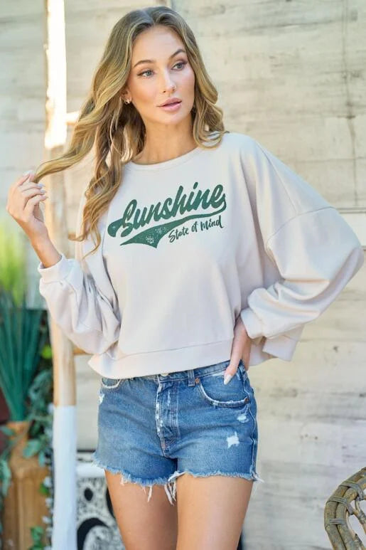 Sunshine State of Mind Taupe Long Sleeve Cropped Top
Graphic printed top with side slit