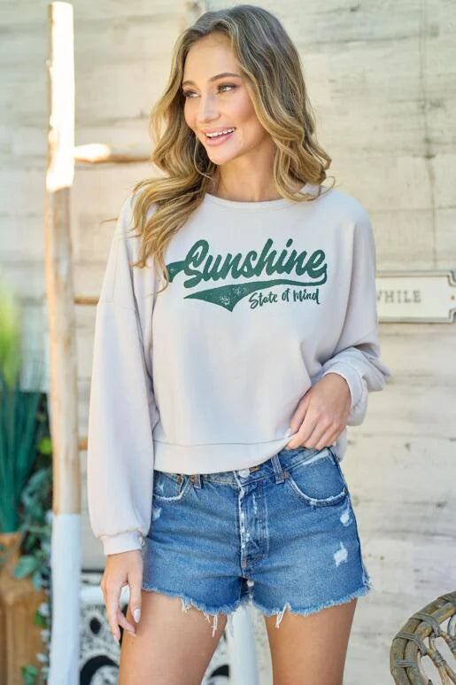 Sunshine State of Mind Taupe Long Sleeve Cropped Top
Graphic printed top with side slit