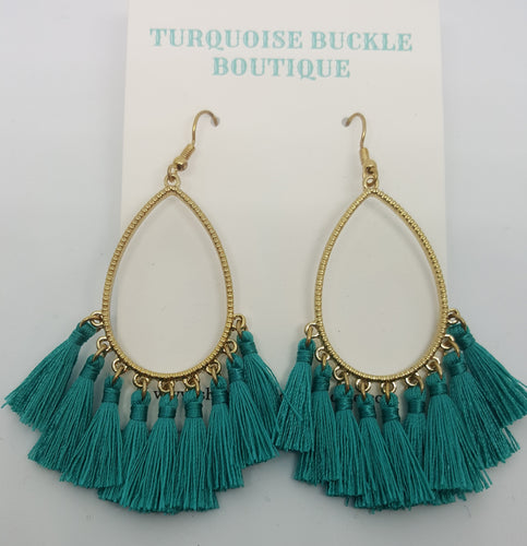 Gold Oval Hoop Earrings with Turquoise Tassels

2.75 inches long