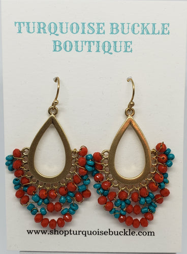 Gold Teardrop fashion earrings with Turquoise and Coral Beads

1 1/2 inches long