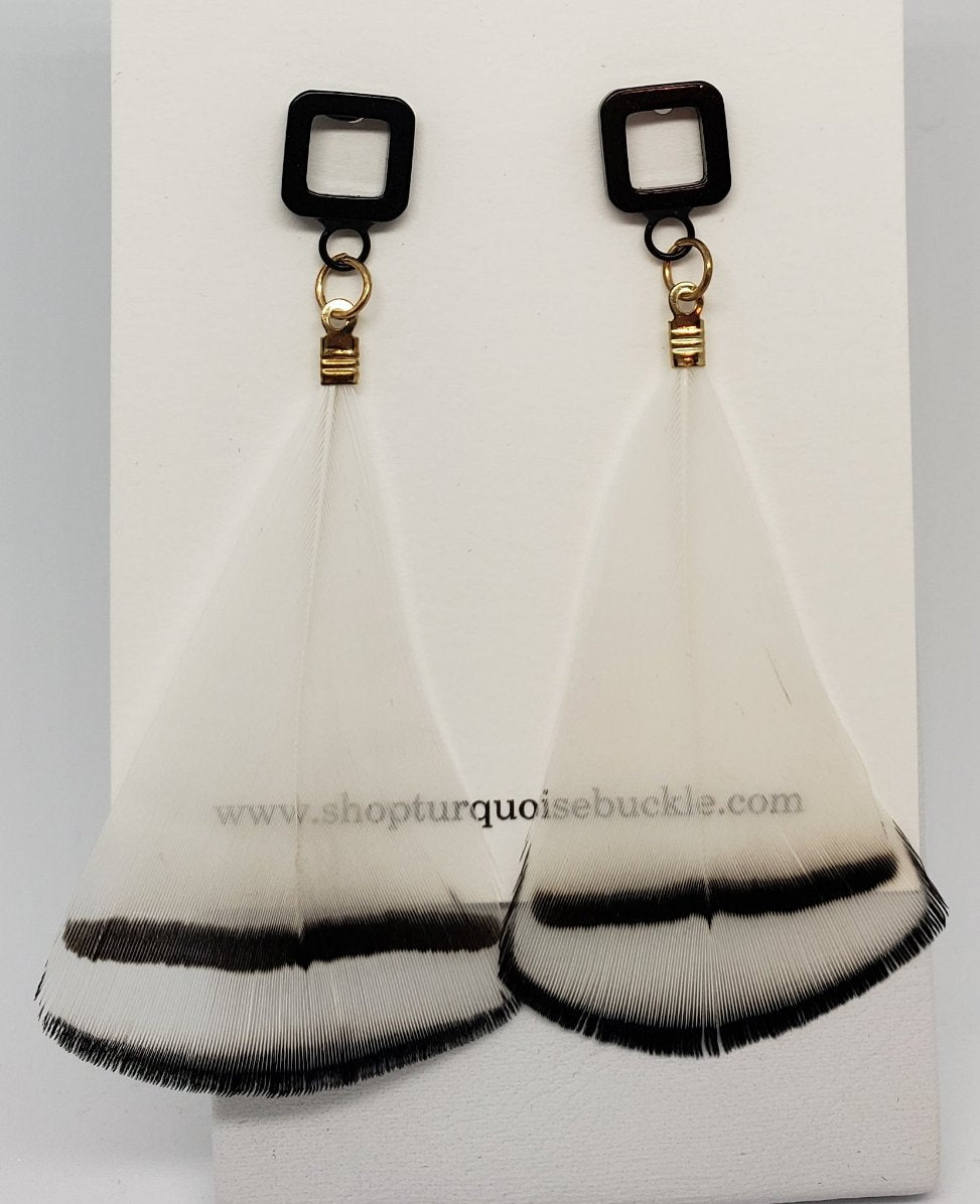 Black and White Feather Dangle Statement Earrings

3 inches long