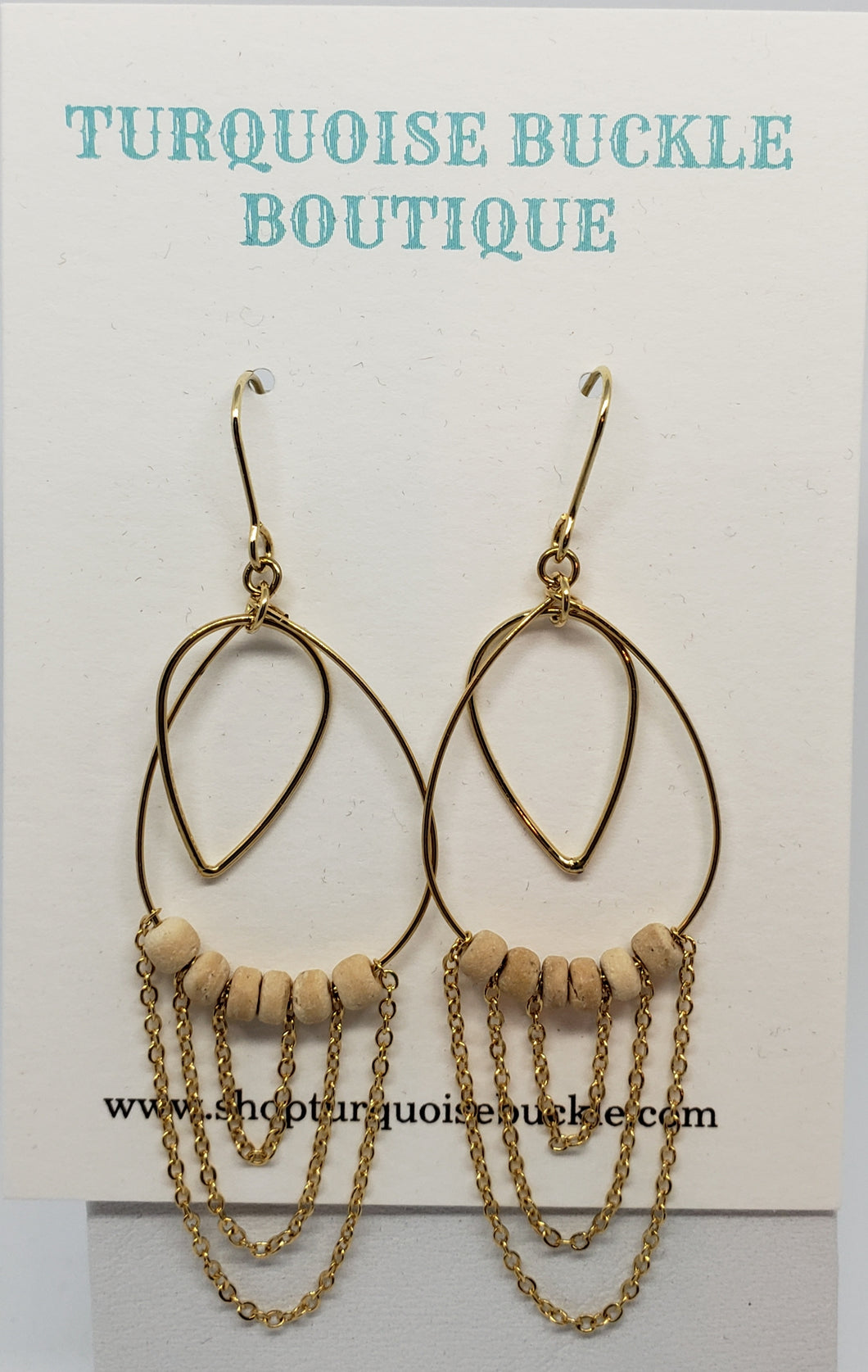 Gold Oval Tear Drop Center Earrings Accented Nude Beads And Three Layer Falling Chains