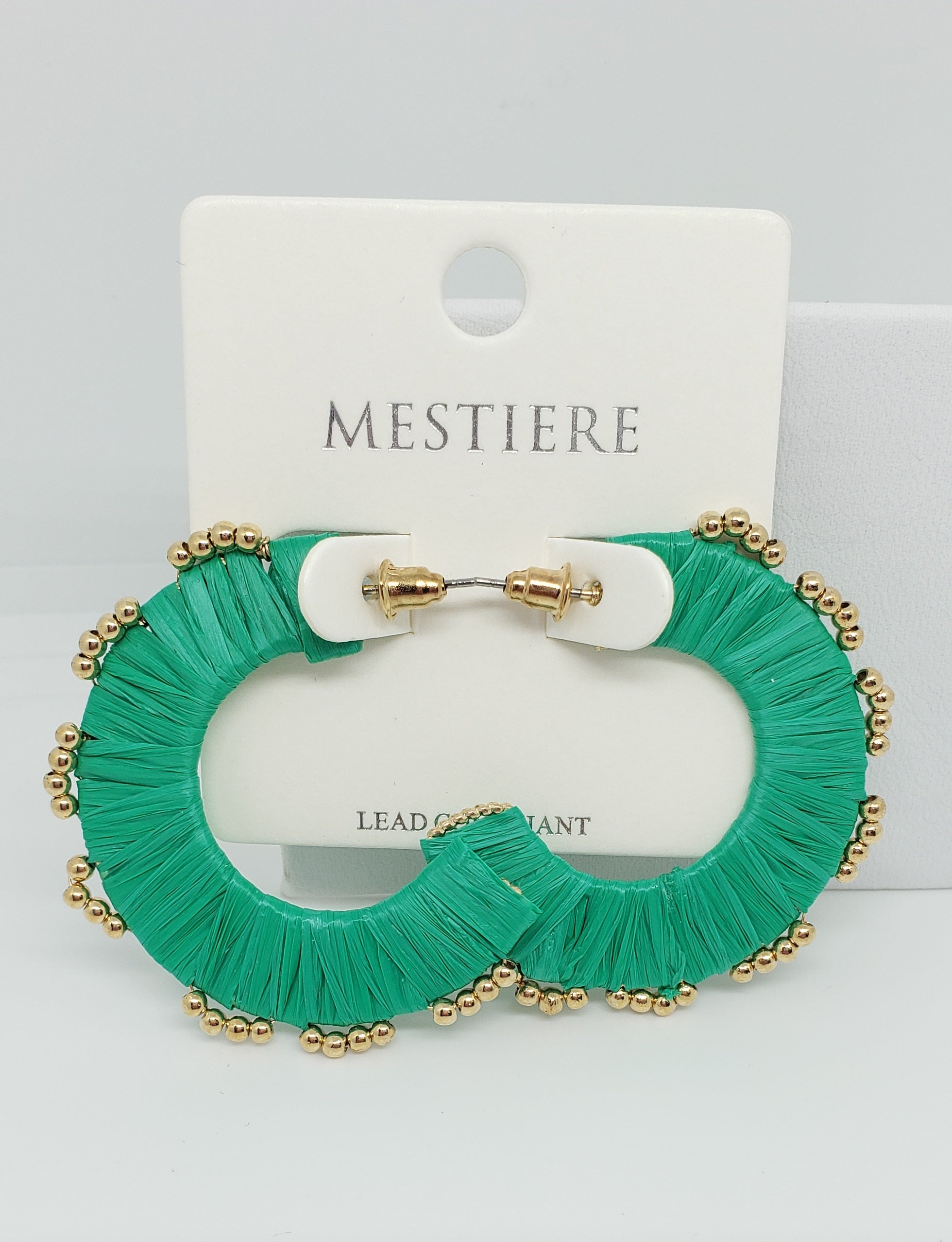 Rattan Wrapped Hoop Earrings

Color: Kelly Green with Gold Beads

Approximate Length: 1.75"