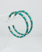 Lightweight Acrylic Resin Green and Gold Hoop Earrings.

Approximate Length: 1.75"