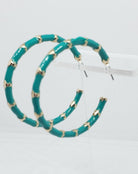 Lightweight Acrylic Resin Green and Gold Hoop Earrings.

Approximate Length: 1.75"
