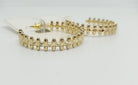 Gold Statement Hoops

Approximate Length: 1.5"
