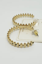 Gold Statement Hoops

Approximate Length: 1.5"