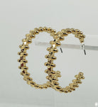 Gold Statement Hoops

Approximate Length: 1.5"