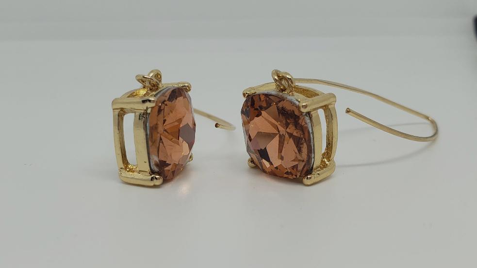 Long drop earrings with citrine stones set in gold-tone mountings.

Approximate Length: 2.25