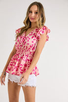 Pink Valentine mood Leopard satin top with V-neck and smocked waist. and Ruffle Sleeves.