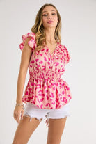 Pink Valentine mood Leopard satin top with V-neck and smocked waist. and Ruffle Sleeves.