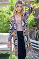 Aztec Southwestern Pattern Long Cardigan:

- Heavy weight and warm
- Open front cardigan with front pockets
- Colors: Black, Ivory, Brown