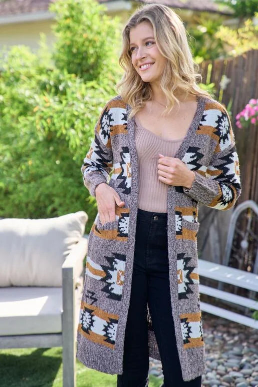 Aztec Southwestern Pattern Long Cardigan:

- Heavy weight and warm
- Open front cardigan with front pockets
- Colors: Black, Ivory, Brown