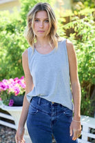 Basic poly rayon spandex solid tank top with loose fit

Available Colors: Ivory, Heather Grey