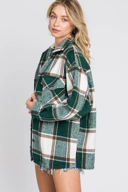 Going Camping Hunter Green, Off White & Black Plaid Long Sleeve Shacket. Relaxed Oversized Fit with two chest pockets, button front and sleeves, with slit sides.

* Color: Hunter Green, Off White, Black Plaid