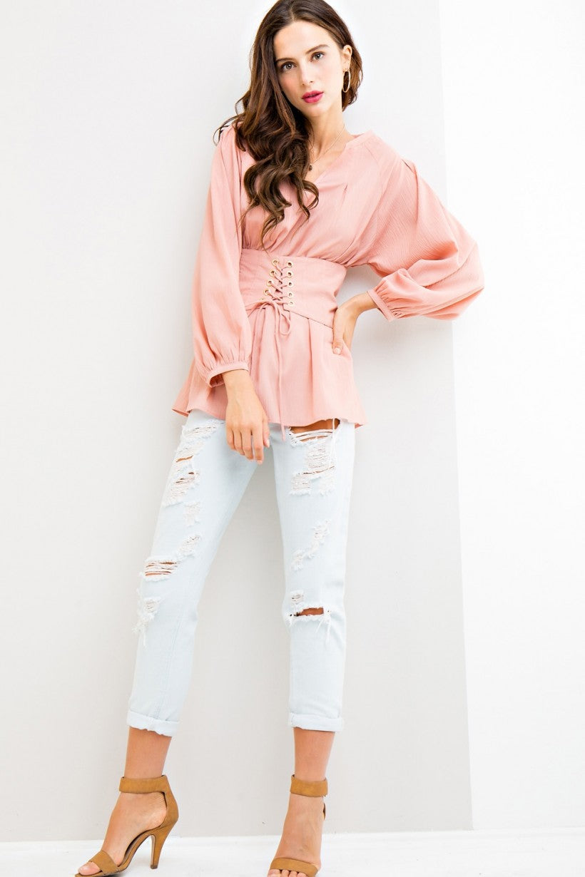 Long Sleeve Fitted Top with Tie Front and Elastic Waist on Back. Color Blush Pink.