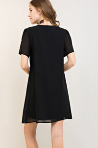 Black Beauty Short Sleeved Dress With Crisscross Tie Closure At Bust