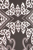Black and white printed tunic top in a relaxed fit with a round neck, short sleeves, side ruched detail, and curved hi-low hem, in Plus Sizes.