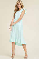 Solid dress featuring ruffled cap sleeve, causal mermaid hem detailing at the bottom skirt

Colors: Magenta, Black, Mint