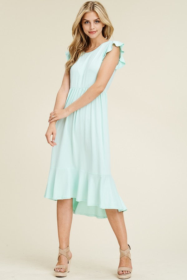 Solid dress featuring ruffled cap sleeve, causal mermaid hem detailing at the bottom skirt

Colors: Magenta, Black, Mint