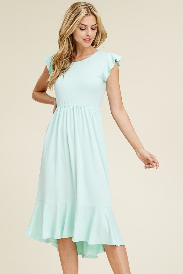 Solid dress featuring ruffled cap sleeve, causal mermaid hem detailing at the bottom skirt

Colors: Magenta, Black, Mint