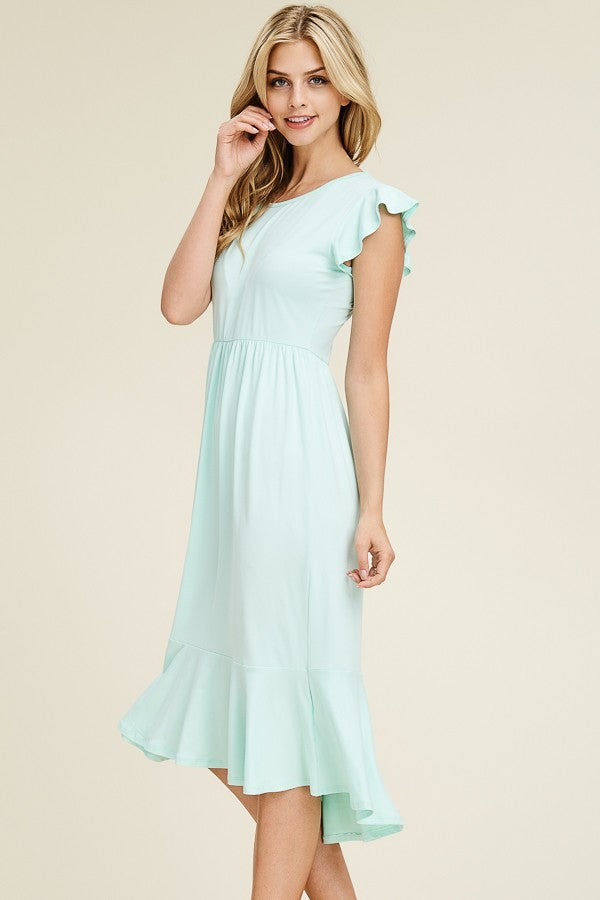 Solid dress featuring ruffled cap sleeve, causal mermaid hem detailing at the bottom skirt

Colors: Magenta, Black, Mint