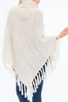 Cream Hand Made Knitted with Fur Accent Luxury Turtleneck Poncho, with tassel fringe trim.