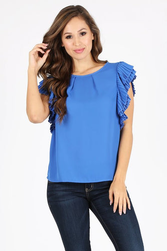 Capri Blue, waist length top in a relaxed fit with a round neckline, pleated short sleeves, and back keyhole with a button closure.  Milk & Honey