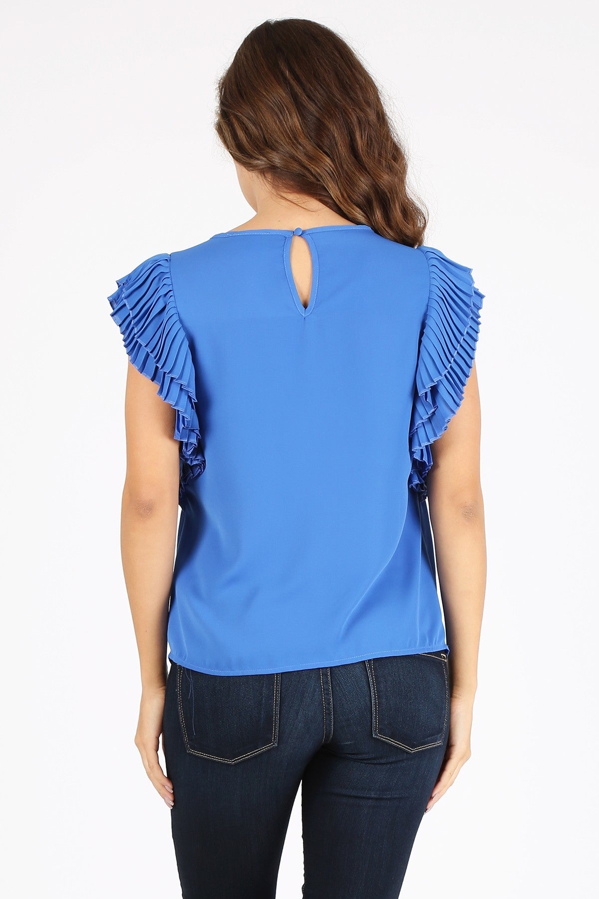 Capri Blue, waist length top in a relaxed fit with a round neckline, pleated short sleeves, and back keyhole with a button closure.  Milk & Honey