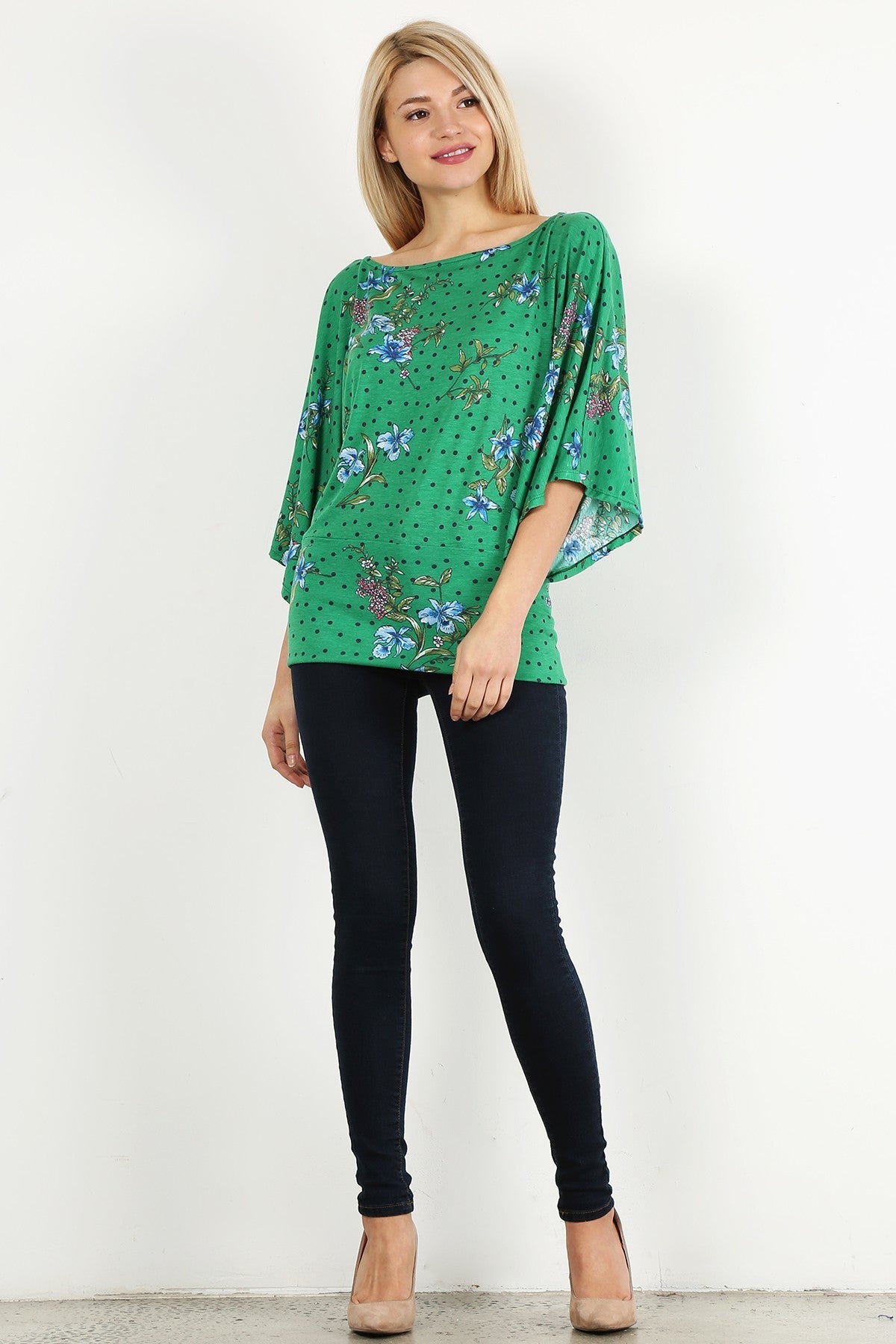 Green Floral Curvy Top with Bell Sleeves and Round Neckline, fitted at the hips.