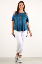 Dusty Pink Short Sleeve Cold Shoulder Top with solid color, waist length, short sleeves in a relaxed style with a crew neck, open sleeves and a hi-lo hem