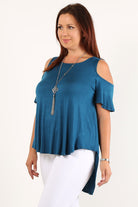 Teal Short Sleeve Cold Shoulder Top with Hi-Lo Hem, solid color, waist length short sleeve top in a relaxed style with a crew neck, open sleeves and a hi-lo hem.

Available in Dusty Pink or Teal with Plus Sizes 1XL, 2XL, 3XL
