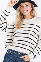 Winter Wonder Ivory and Black Striped Sweater with Zigzag ribbed knit pattern.
Color: Ivory
Super soft casual and slightly oversized for a slouchy fit with a shorter length.