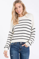 Winter Wonder Ivory and Black Striped Sweater with Zigzag ribbed knit pattern.
Color: Ivory
Super soft casual and slightly oversized for a slouchy fit with a shorter length.