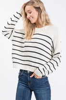 Winter Wonder Ivory and Black Striped Sweater with Zigzag ribbed knit pattern.
Color: Ivory
Super soft casual and slightly oversized for a slouchy fit with a shorter length.