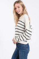 Winter Wonder Ivory and Black Striped Sweater with Zigzag ribbed knit pattern.
Color: Ivory
Super soft casual and slightly oversized for a slouchy fit with a shorter length.