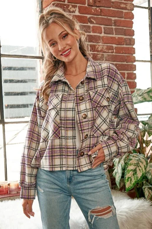Lilac Plaid Crop Shacket with two button down front pockets, button front & sleeves.

Color: Lilac, Ivory and Black Plaid